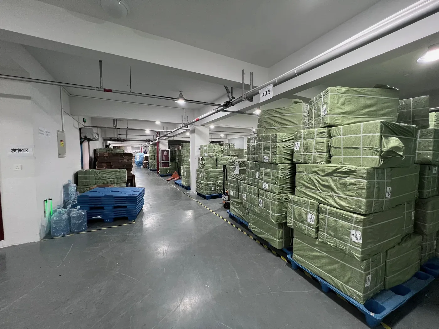 Shipping area with pallets of packed orders ready for worldwide dispatch