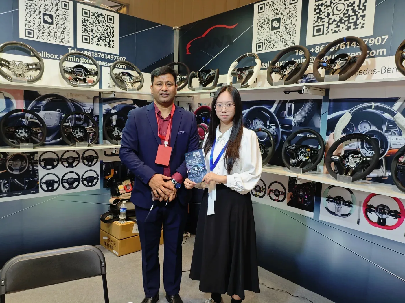 NIEVELT steering wheel display at a trade show booth